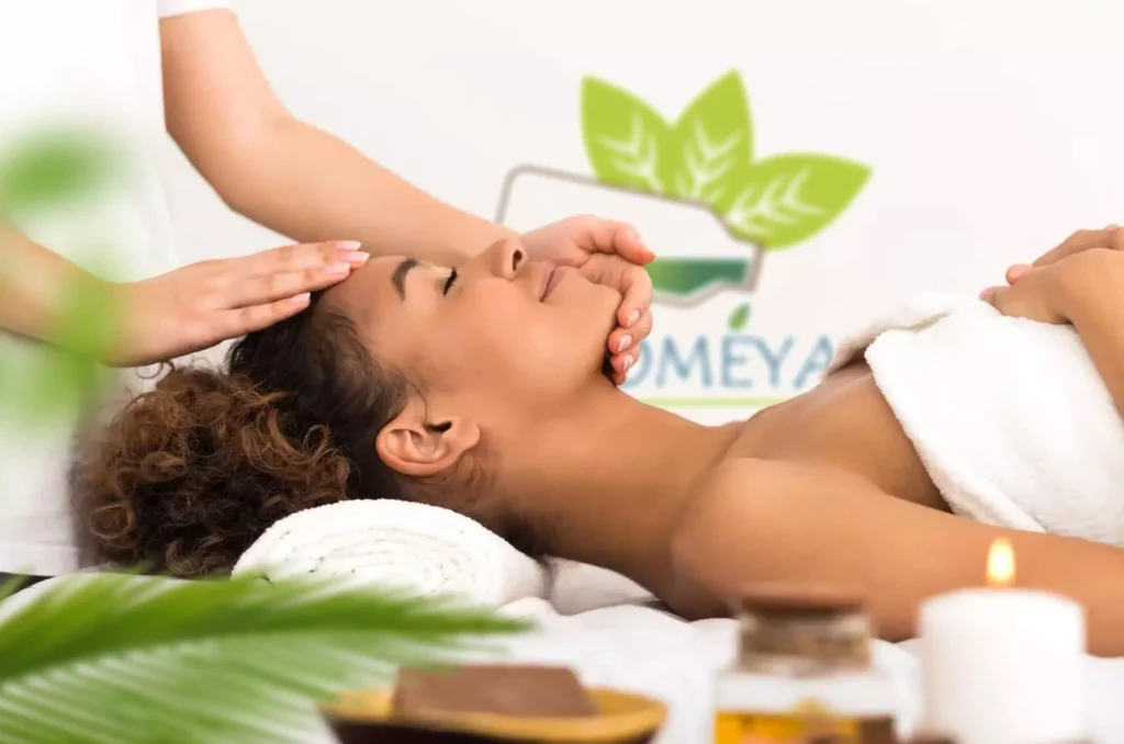 A beautiful woman applying skincare using essential and vegetable oils